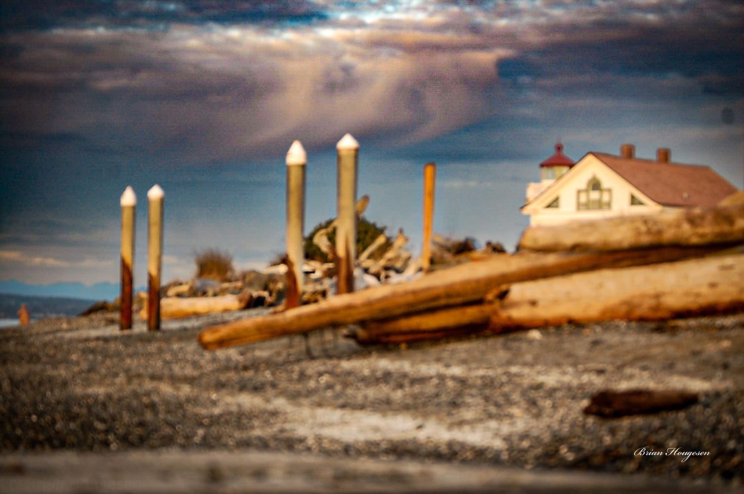 A pile of wood sitting on top of the ground.