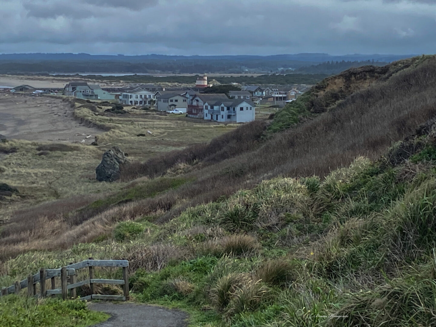 A view of the hills and houses from above.