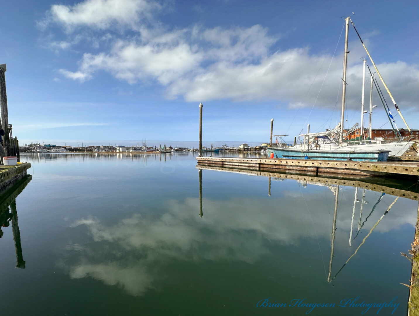 A body of water with boats docked in it.